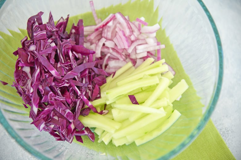 red cabbage, cucumber and red onion for slaw 
