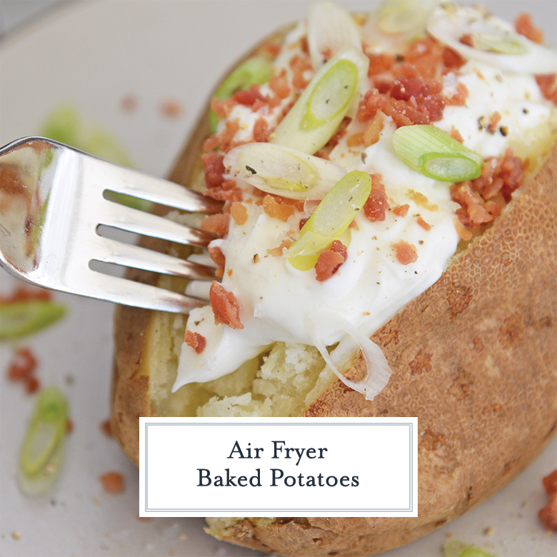 Fork digging into a fluffy baked potato