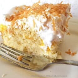 slice of coconut poke cake