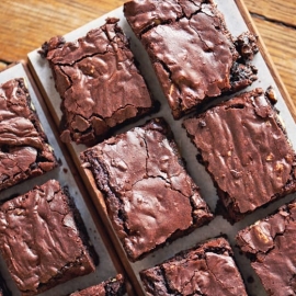 sliced brownies on parchment paper