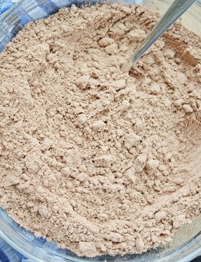 dry brownie mix in a glass mixing bowl