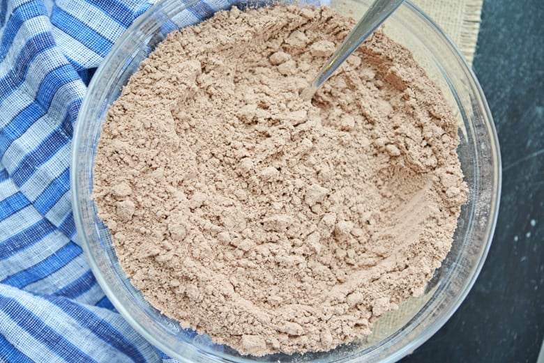 dry brownie mix in a glass mixing bowl 