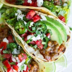 overhead shot of three lentil tacos