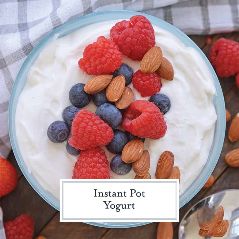 Bowl of yogurt with fresh berries and almonds 