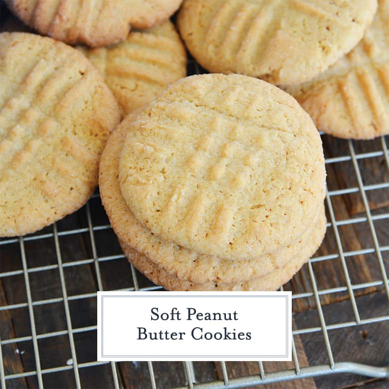peanut butter cookies on a cooling rack with blue linens