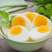 bowl of halved air fryer hard boiled eggs