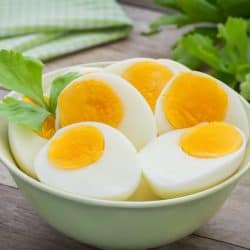 bowl of halved air fryer hard boiled eggs