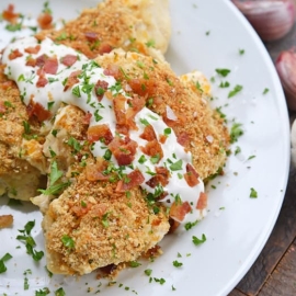 A plate of food, with Bacon and Chicken