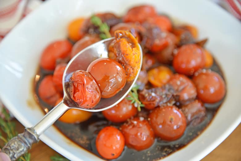 spoon of 3 balsamic stewed tomatoes 