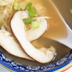 close up of sliced mushroom in soup