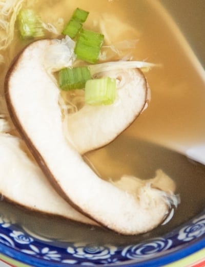 close up of sliced mushroom in soup