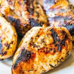 close up of grilled chicken on a plate
