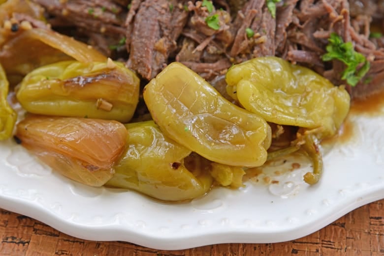 close up of pepperoncini with shredded beef 