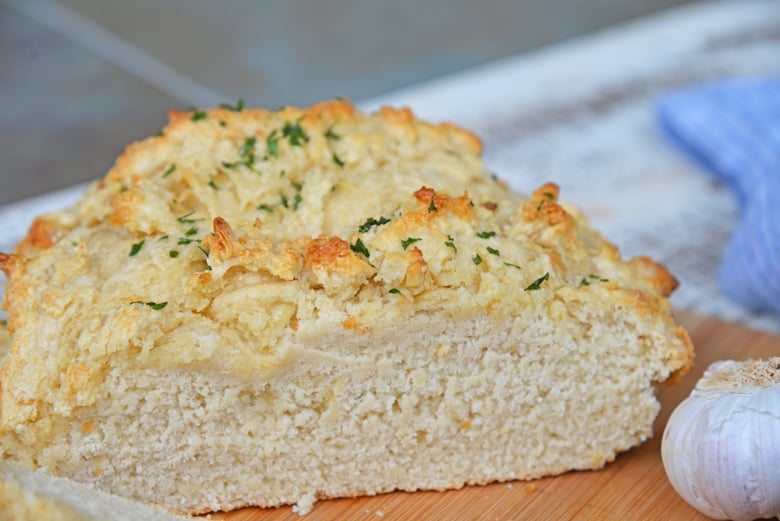 roasted garlic artisan loaf cut in half 