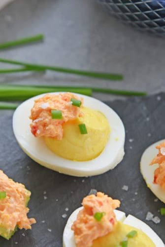 pimento cheese hard boiled egg on slate serving tray
