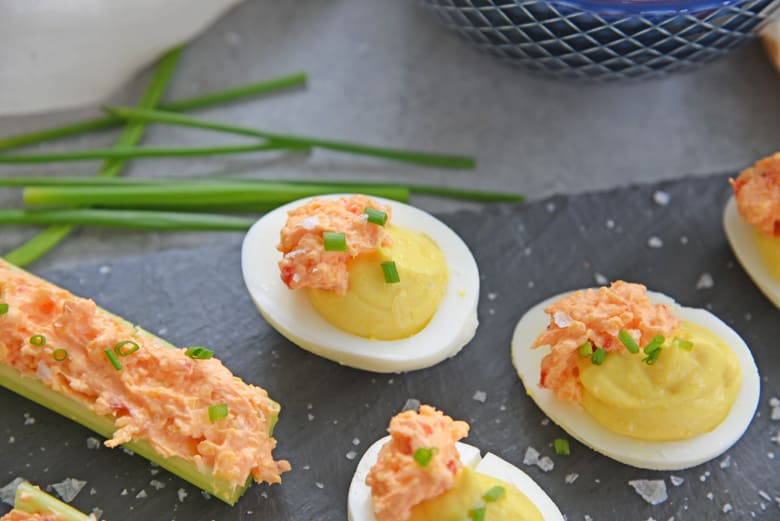 pimento cheese hard boiled egg on slate serving tray