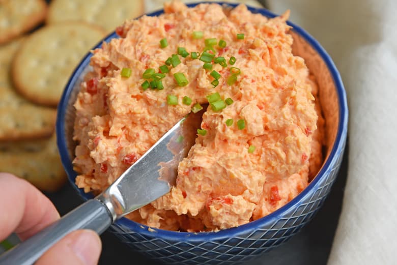 pimento cheese spread in a blue bowl 