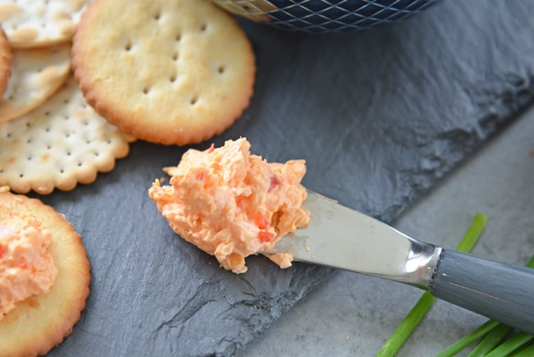 pimento cheese on a spreading knife 