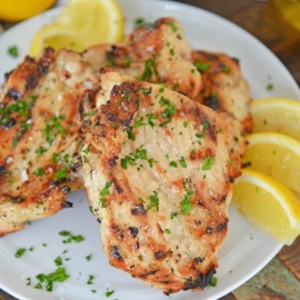 white plate of grilled chicken