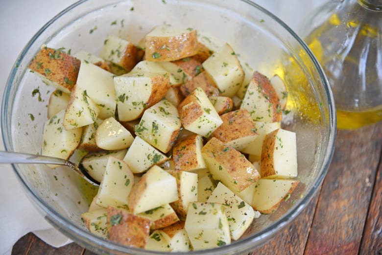 A bowl of food, with Potato and Ranch dressing