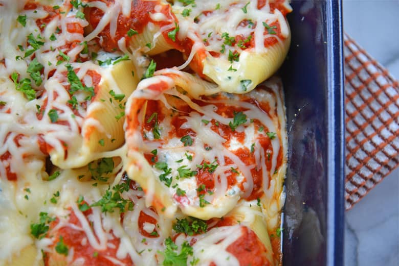 close up of baked stuffed shells 