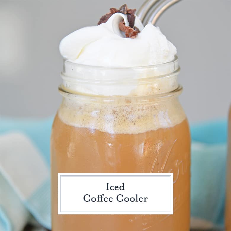 frozen coffee drink in a mason jar with whipped cream 