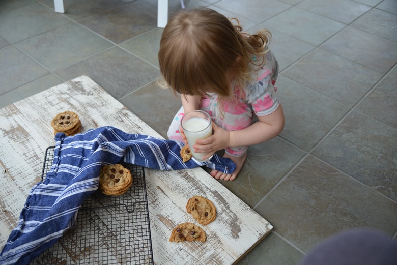 A small child sitting on a table