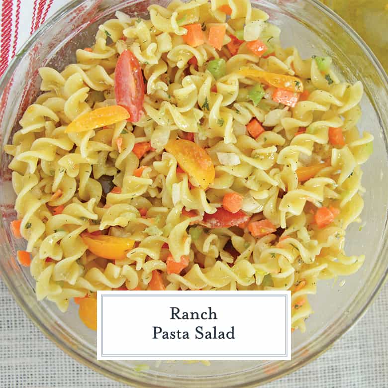 overhead of cold pasta salad with tomatoes 