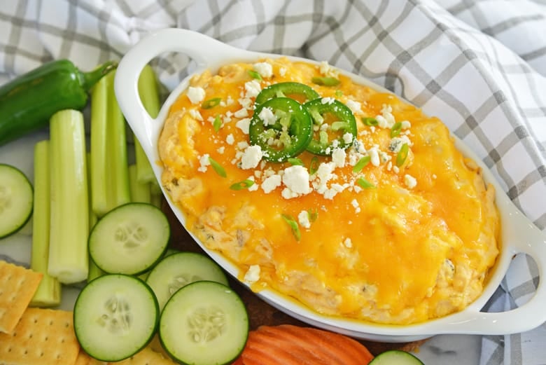 jalapeno buffalo chicken dip with cucumbers, carrots and crackers 