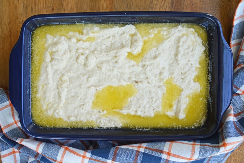 unbaked butter float biscuits in a blue baking dish 