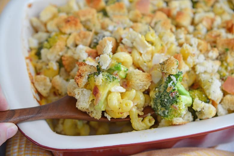 spoon digging into broccoli chicken casserole 