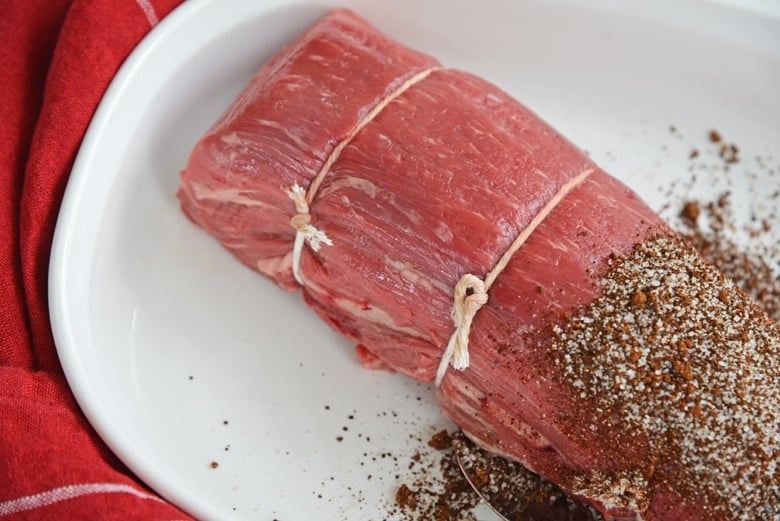 close up of tied beef tenderloin roast 