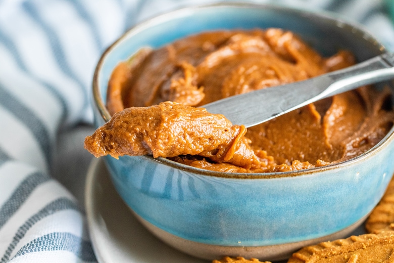 homemade cookie butter on a butter knife on a bowl 