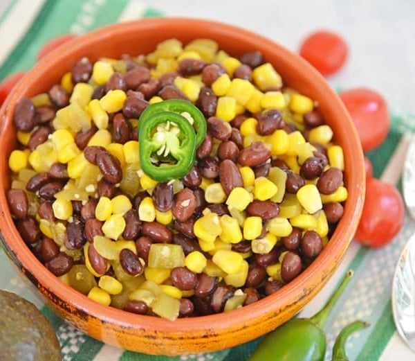 orange bowl of corn and bean salad