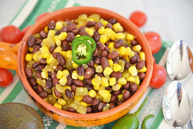 orange bowl of corn and bean salad