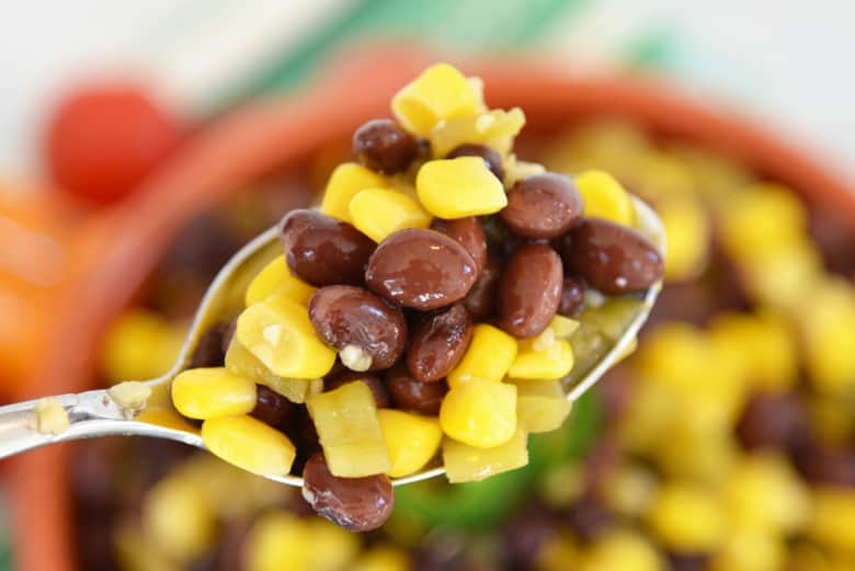 black bean salad on a spoon 