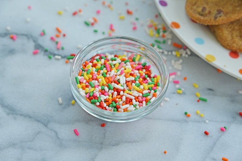 rainbow sprinkles in a clear glass bowl 