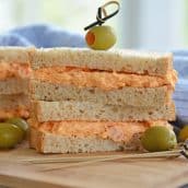 pimento cheese sandwich on wheat bread with olives