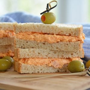 pimento cheese sandwich on wheat bread with olives