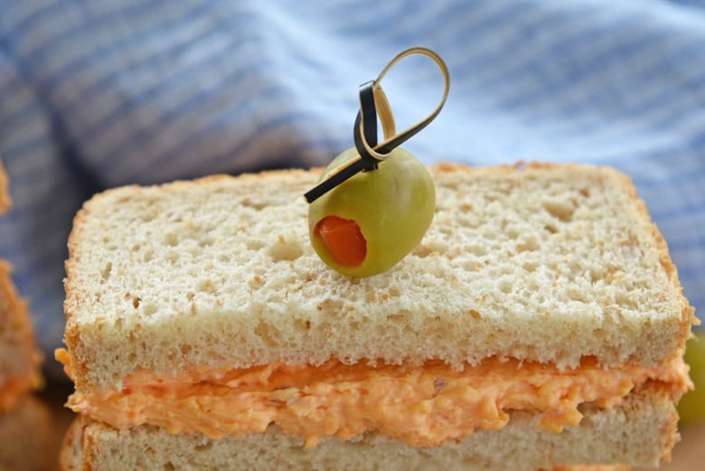 close up of olive secured with a toothpick