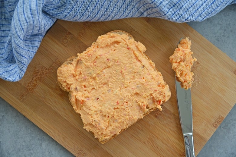 pimento cheese spread on slices of bread 