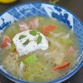 bowl of Sauerkraut Soup with sour cream garnish