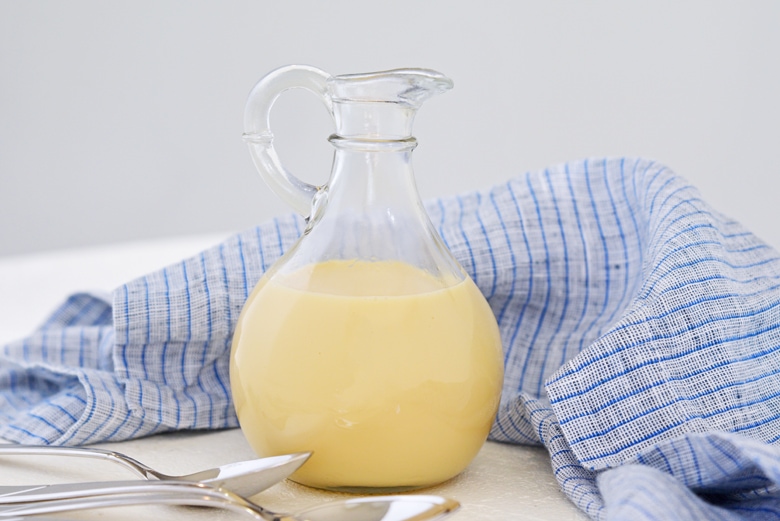 glass jar of homemade sweetened condensed milk 