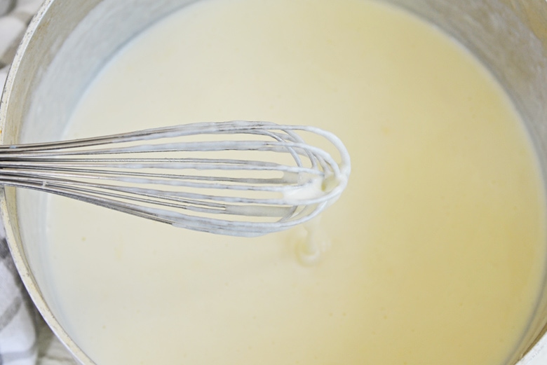 smoked gouda cheese sauce in a saucepan