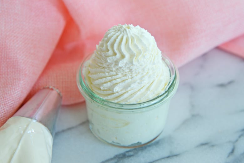 stabilized whipped cream in a glass bowl 