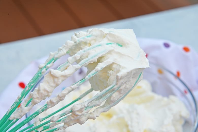 stabilized whipped cream on a whisk 