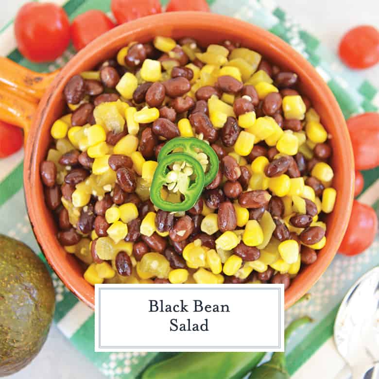 Overhead of black bean and corn salad with jalapenos in orange bowl  