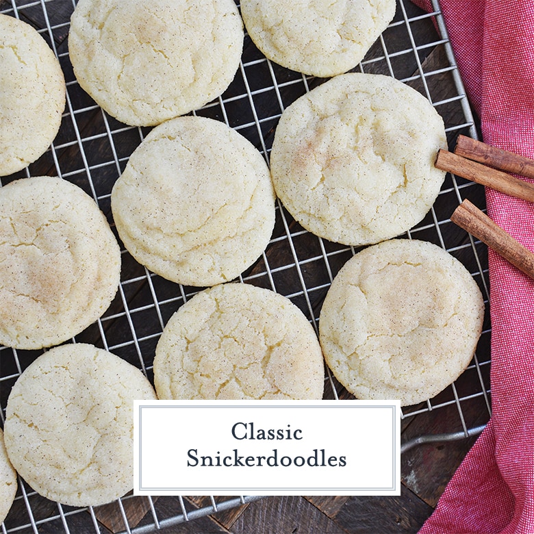 Snickerdoodle cookies on a cooling rack with cinnamon sticks 
