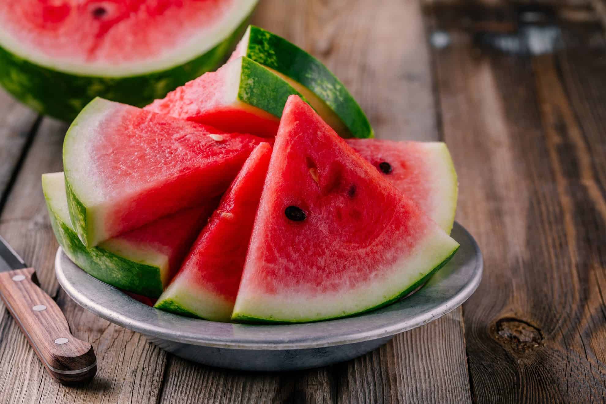 sliced watermelon on a silver plate 