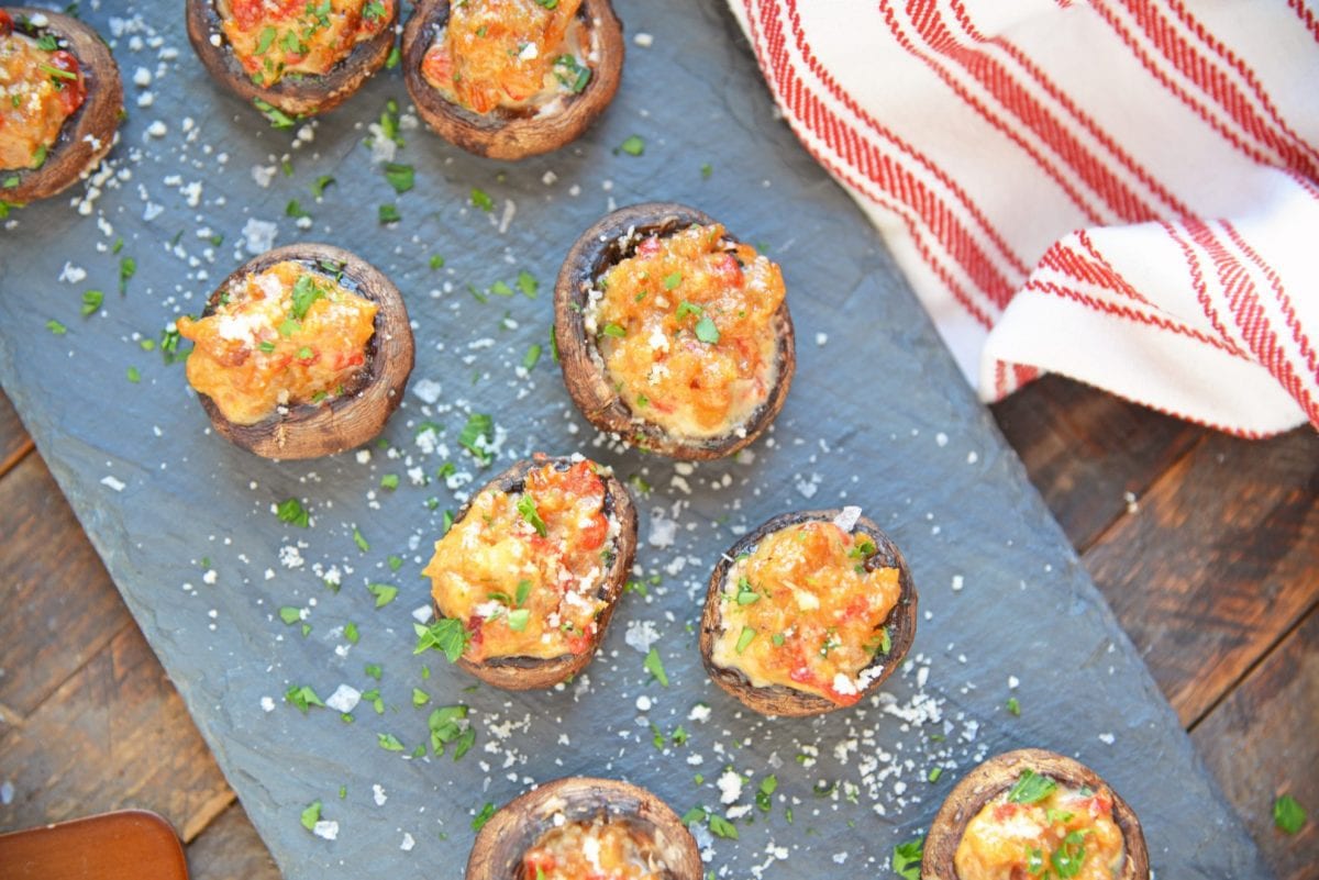 stuffed mushrooms on a slate serving platter 